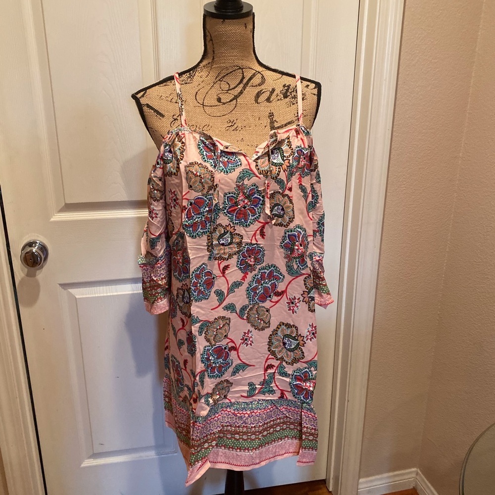 Floral print off the cold shoulder dress.